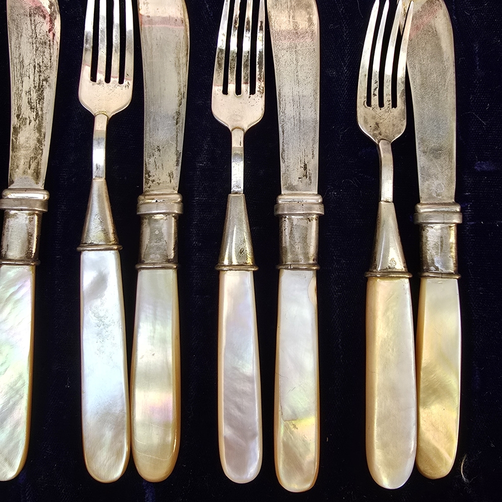 Cartier Silver and Cream Flatware Collection